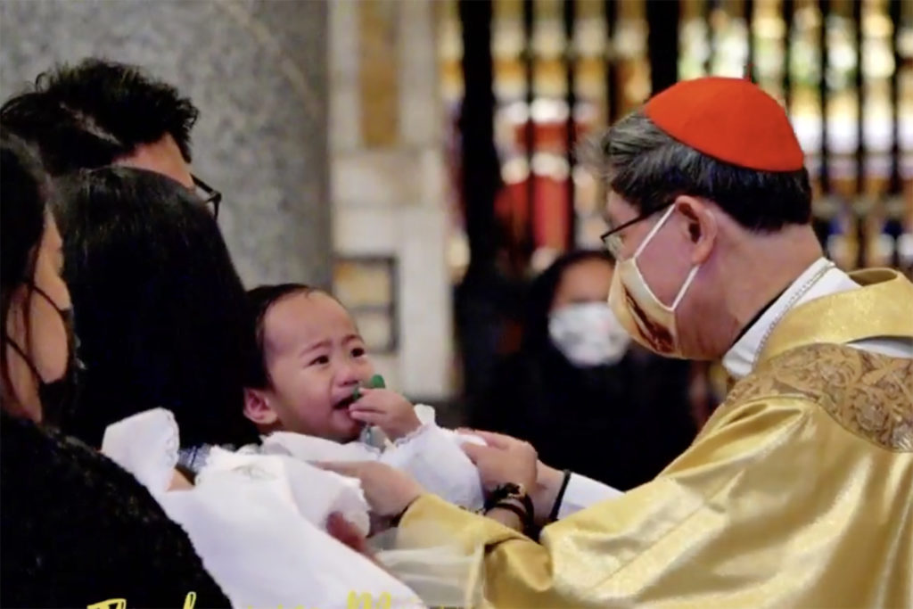 Cardinal Tagle Baptizes Children in Rome